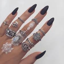 Black Matte Almond Shaped Nails With Lots Of Rings Almond Shape Nails Jewelry Hair And Nails