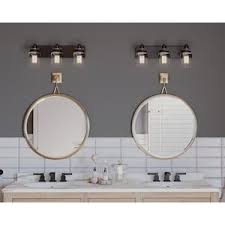 A gorgeous bathroom vanity can often redefine the look of your entire bath area and with the amount of variety currently on offer when it comes to add to these beautiful vanities some amazing lighting and you have an attractive and at times astonishing outcome that offers a whole new dimension to. Progress Lighting Calhoun 3 Light Bronze Transitional Vanity Light Lowes Com Round Mirror Bathroom Vanity Lighting Bath Vanity Lighting