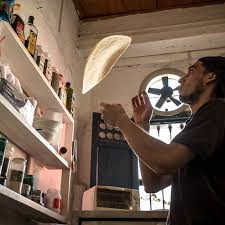Tossing A Pizza 101 It Might Seem Like Tossing Pizza Dough Is Showboating A Fancy Way To Shape And Stretch Out Pizza Dough Pizza Dough Pizza Logo Pizza 101