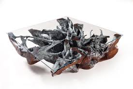 This teak root coffee table embodies the quality craftsmanship and unmatched style you've come to expect from our brand. Graviola Teak Root Coffee Table Coffee Tables