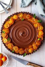 Vegan Chocolate Orange Truffle Tart With Candied Kumquats Crumbs Caramel Recipe Chocolate And Orange Tart Chocolate Orange Vegan Chocolate