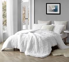 Down comforters are traditionally white, but you can dress them up with a colorful cover. Luxuriously Soft Silk Like Plush In Easy To Match White Color Oversized Twin Xl Comforter