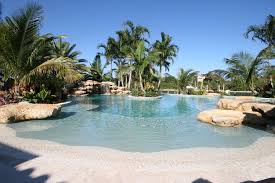 Jupiter Palm Beach Gardens Lagoon Freeform Tropical Pool Custom Sunshelf Spa Beach Entry Beach Entry Pool Custom Swimming Pool Palm Beach Gardens