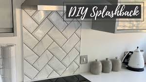 Subway tile is an increasingly popular backsplash choice for kitchens, bathrooms, and utility rooms. How To Cheap Diy Herringbone Splashback Splashback Tiling Youtube