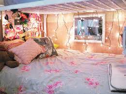 Bunk beds are supported on four pillars on each corner. 19 Super Cozy Ways To Use String Lights In Your Home