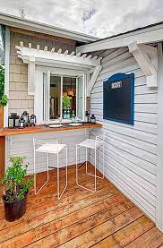 A kitchen pass through window was originally made to help maids and butlers serve food in other rooms. Outdoor Window Bar Novocom Top