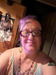 Hi all! I just wanted to introduce myself and share a photo my hubby took  with that purple jewelry i got from you. It matches that dress perfectly.