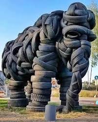 Even Looking At This Makes Me Tired In 2020 Tire Art Elephant Sculpture Unusual Art