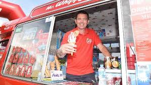 Former banker Darren is now an ice cream man and serves Mad Sundaes to TT  fans
