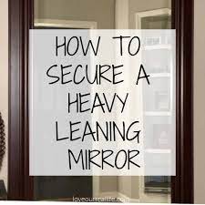 Allow it to fall into the wall cavity. How To Secure A Heavy Leaning Mirror To The Wall Love Our Real Life