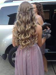 Blonde Curls With A Waterfall Braid Connecting Both Sides Very Sweet And Youthful Prom Hairstyles For Long Hair Simple Prom Hair Hair Styles