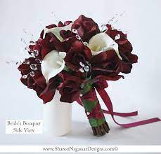 Calla lily inspired bridal bouquet. Bridal Bouquet Calla Lily Burgundy Spray Roses Not This Dark With Jewels Add White Hydrangea White Flower Bouquet Wedding Bridal Bouquet Wedding Flowers