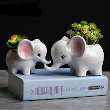 Accentuate the natural beauty of greenery with elephant plant pot from alibaba.com. Who Doesn T Love Baby Elephants These Little Cuties Will Look Adorable On A Desk Or Shelf Or In The Baby S Nurs Flower Pots Succulent Pots Flower Pot Design