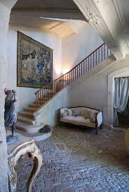 Tapestry Chalky Walls Sweeping Staircase Towering Ceilings Stone Brick Floor Elegant Maison De Campagne Francaise Interieurs Francais Idee Entree Maison