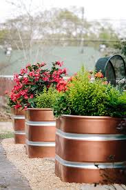 Patio Design With Copper Garden Accents And Succulents Garden Pond Design Diy Raised Garden Patio Design