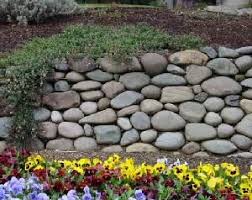 How To Clean Seal Restore River Rock Sealing Cleaning Problem Landscaping With Rocks Stone Landscaping Rock Fence