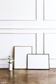 Dlquarts 6x8 picture frames with linen mat,solid wood & hd glass photo frames set of 2 for wall or tabletop, display pictures 4x6 with mat & 6x8 without mat,vintage white 4.2 out of 5 stars 45 $16.99 $ 16. Download Premium Image Of Frame Against A White Wall By A Vase Of Flowers White Photo Frames Wall Vase Picture Frame Wall