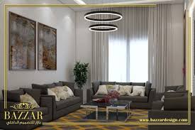 مجلس رجال مودرن بتصميم عصري وبسيط تم اختيار اللون الابيض لطلاء الجدران و اللون الرمادي للكنب و هم احدى الالوان الشائعه في تصميمات الطرا Home Decor Design Decor