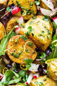 Vegan Potato Salad With Roasted New Potatoes Complemented By A Simple Vegan Pesto And Lemon Dressin Vegan Potato Salads Vegetarian Recipes Potatoe Salad Recipe