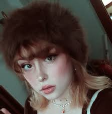 Marilyn Monroe in an unused costume for Gentlemen Prefer Blondes (1953).  This jeweled belt and feather fan are part of the original William “Billy”  Travilla designed costume Marilyn was to have worn.