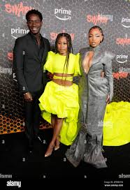 From left, Damson Idris, Dominique Fishback and Chloe Bailey pose ...