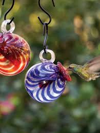 Before you create a hummingbird habitat, there are several important things you must know, and do, to attract these beautiful creatures and to protect them. Hanging Blown Glass Hummingbird Feeder