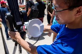 Ready to turn your eyes to the sky next Monday? Until then, enjoy these  throwbacks from 2017—the last time we gathered to watch a solar eclipse  from the Hilltop! Join us from