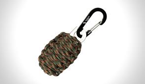 This highly rated survival kit pull includes tin foil, tinder, fire starter, fishing lines, fishing hooks, weights, swivels, dobber, and knife blade all wrapped in a 7ft paracord rated up to 500lbs. Friendly Swede Carabiner Grenade Survival Kit Muted