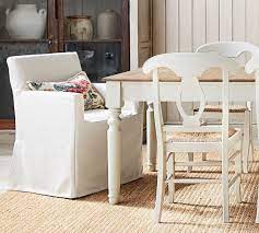 Insert and slipcover are sold separately; Classic Long Dining Armchair Slipcover Only Pottery Barn