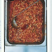 Slow Cooked Tomato And Herb White Beans Recipe Epicurious Com Slow Carb Recipes Vegetable Recipes Grilled Sausage