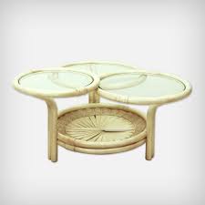 This coffee table leans into its coastal farmhouse look with natural wood finishes and a mixed material design. German Rattan Glass Coffee Table By Flechtatelier Schutz 1970s 161466