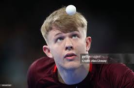 Tom Jarvis of Team England serves against Vicky Wu of Team Fiji... News  Photo