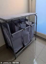 65cm (h) x 68cm (w) x 33cm (d) box dimensions: Kmart Australia Shoppers Are Obsessing Over This 45 Two In One Laundry Hamper With An Ironing Board Daily Mail Online