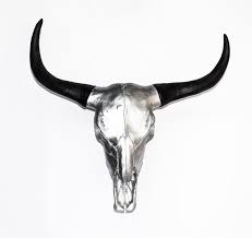 Are cow skulls all made from real cow head bones? This Is A Very High Quality Replica Bull Cow Steer Skull Life Size This Is A One Of A Kind Bull Skull Painted Silver To G Skull Art Cow Skull Skull Painting