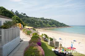 Carbis bay beach is a tranquil cove with soft white sand, clear calm water and surrounded by lush greenery. Carbis Bay Hotel Estate Review What To Really Expect If You Stay