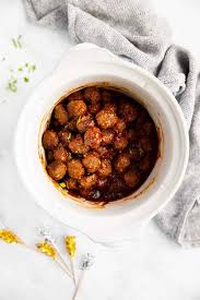 Continue until all the meatballs have been shaped and transferred to the slow cooker. Ckmywrtdkdw1nm