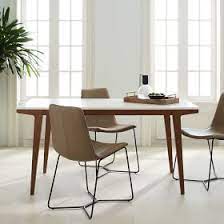Stowed, it's just big enough for you and your laptop. Modern Expandable Dining Table