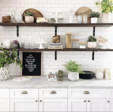 On the l shaped portion the shelves are 10 deep on one side and 11.5 on the other. Height Of Floating Kitchen Shelves Bigger Than The Three Of Us