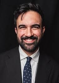 Look at Mamdani's left hand. ha ha ha**