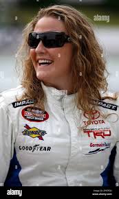 ARCA driver Chrissy Wallace smiles as she waits for the start of the ARCA  RE/MAX Series Pennsylvania 200 auto race at Pocono Raceway in Long Pond,  Pa., Saturday, Aug. 2, 2008.(AP Photo/Nam