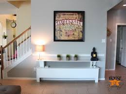 The increased ceiling height was conceived by adding some structural columns and a triple barrel arch, creating a usable balcony that connects to the original back stairwell and overlooks the kitchen as well as the. Chair Rail In The Family Room And Breakfast Nook House Of Hepworths