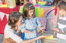If you have access to a garage, use it. Kids Having A Garage Sale Assisted By Grandmother Zef004888 Zerocreatives Westend61
