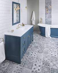 In this bathroom, we see a sample of the herringbone tile switch we looked at earlier. Inspiring Bathroom Design Using Brick Format Tiles Vanity Hall