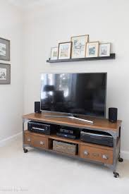 Adding A Shelf Above The Tv A Simple Decorating Solution Driven By Decor Decor Around Tv Tv Decor Shelf Above Tv