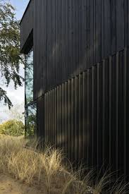 Blacked Timber Against White Surfaces And Whith Dark Alu Framed Doors On The Rear Elevation Is Another Suggestion Facade Bois Refaire Maison Bardage Bois