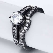 Instead of bending around an engagement ring, the wedding band features a notch that allows the two rings to fit together like puzzle pieces. Jewelry Round Black Gold Puzzle Piece Wedding Ring Set Poshmark