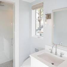 Use candles and colourful accessories to add further interest and comfort. Light Gray Bathroom Walls Design Ideas