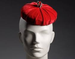 1960s Vintage Red Wool Hat With Black Feather by Kurt Jr. for Tom Hann
