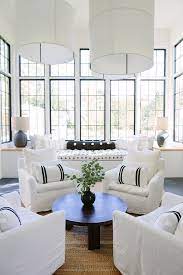 Chair Sitting Are The Four Chairs In The Center Of The Room And The Huge Fabric Pendant Formal Living Room Decor Formal Living Room Designs Formal Living Rooms