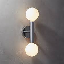 Shop Double Post Sconce Understated Design By Mermelada Estudio Is Alluring In Its Simplicity Shiny Chrome Finish Sconces Wall Sconces Modern Wall Sconces
